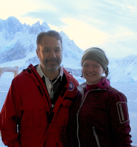 Ted and Erin Pettit, glaciologist at University of Alaska, Fairbanks, with a backdrop of the peaks and glaciers ringing Beascochea Bay.